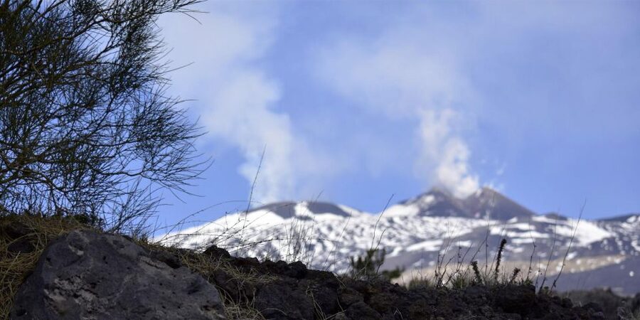 From Catania: trek on Mount Etna, Lava Cave & tasting Tour - Walking across Etna’s extinct craters and lava fields