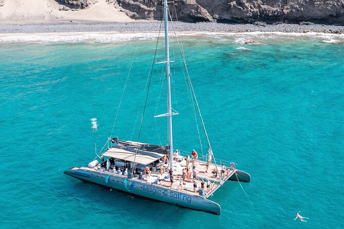Fuerteventura: Magic Select Catamaran Trip with Food & Drinks - Sailing out of Morro Jable under a 150-square-meter sail