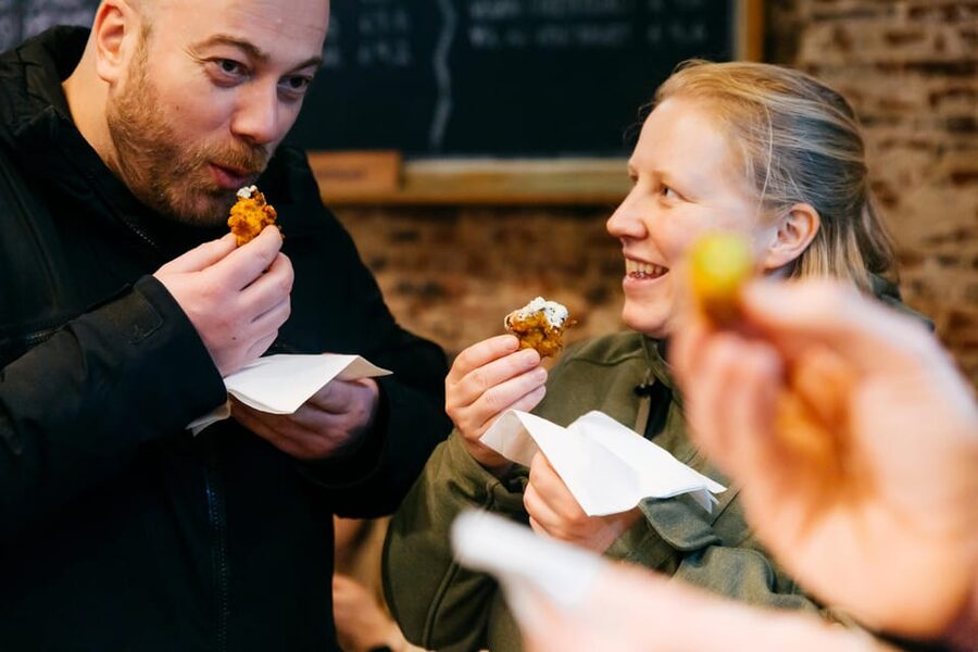 Ghent: Food & Drink Walking Tour with Tastings - Walking through Ghent with stories attached