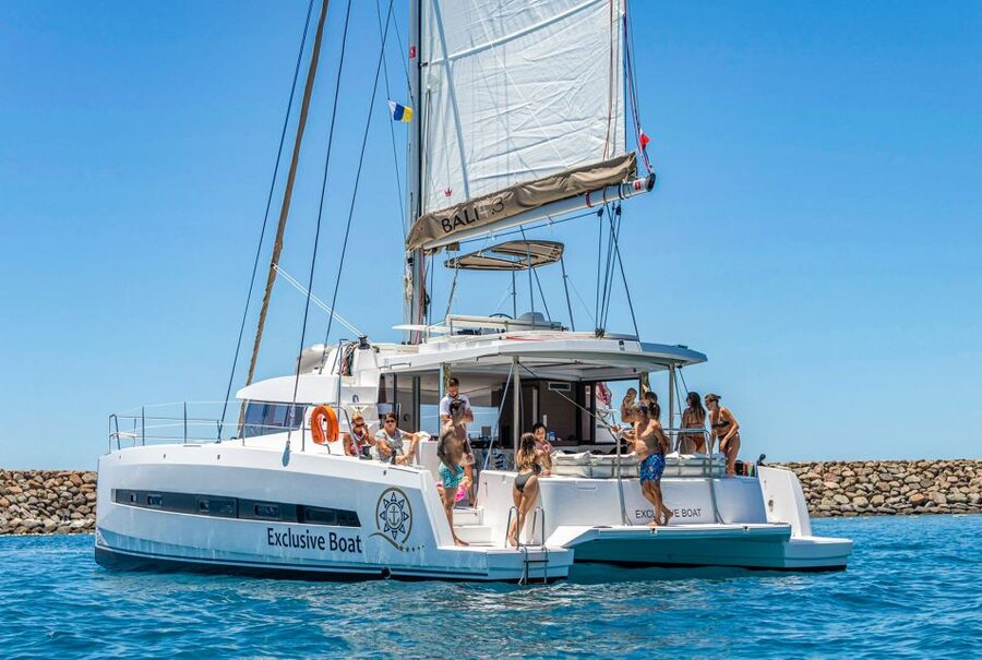 Gran Canaria: Catamaran Day Trip with Food and Drinks - First stop: snorkeling, swimming, kayaking, and SUP
