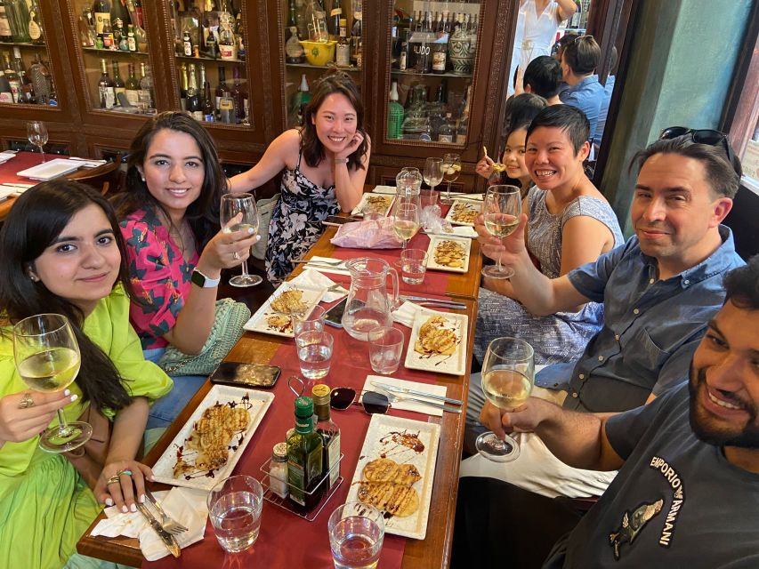 Granada: Walking Food Tour - Granada’s food story begins with ham, wine, and olive oil
