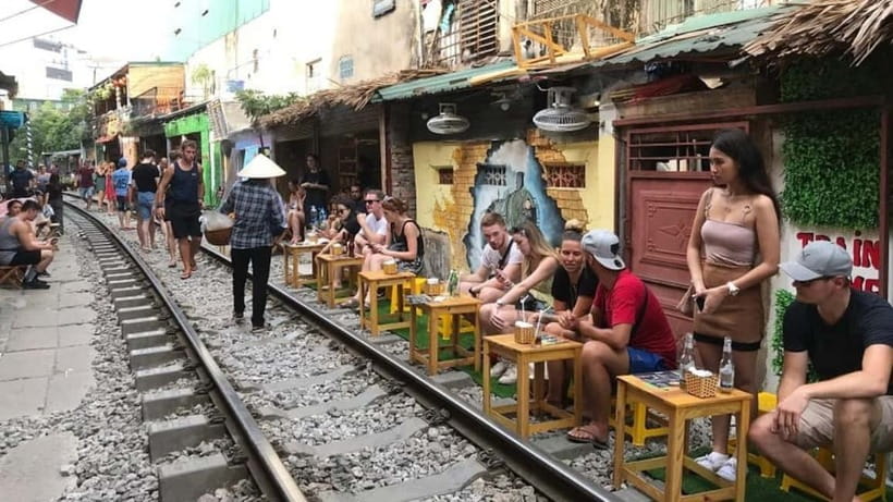 Hanoi: Eat Like a Local Small Group Street Food Tour - Spring rolls, steamed rice rolls, and banh mi