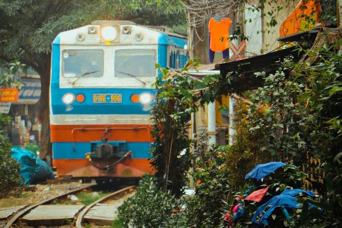 Hanoi Walking Street Food Tour with Train-Street Visit - Starting with bun cha and spring rolls