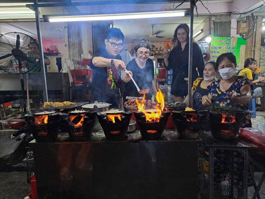 Ho Chi Minh City: Food Tour by Scooter with Eleven Tastings - District 10 brings fried bao and crispy rice