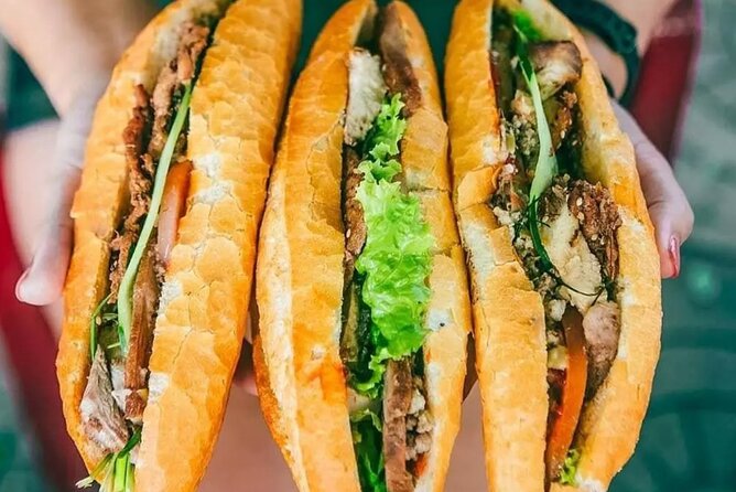 Ho Chi Minh City Street Food Tour & Sightseeing By Motorbike - Ho Thi Ky Flower Market and fresh spring rolls