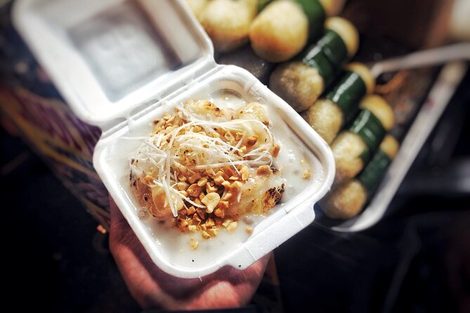 Ho Chi Minh City Street Food Tour & Sightseeing By Motorbike - The Cambodian Market and local snack culture