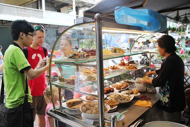 Ho Chi Minh City: Street Food Walking Tour with 12 Tastings - Jus and the value of a strong local guide