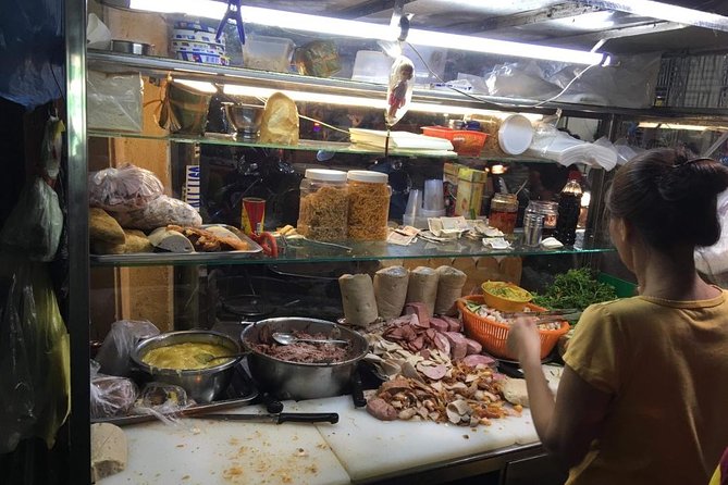 Ho Chi Minh City: Street Food Walking Tour with 12 Tastings - Bún Bò Huế gives you a serious first taste