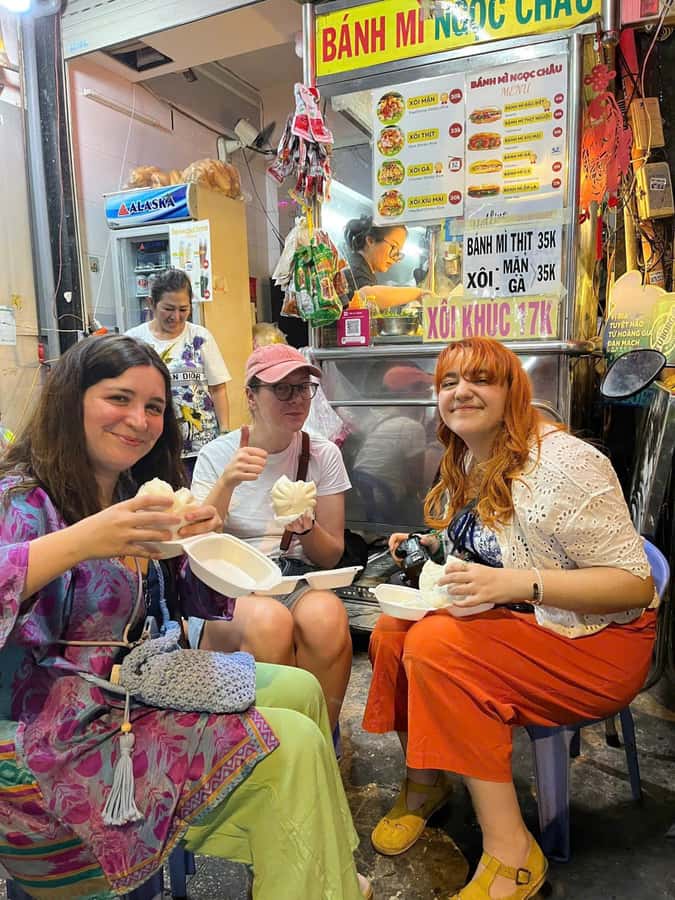 Ho Chi Minh: Local Food Tour by Scooter with Vegan Option - Vietnamese pizza, grilled rice paper, and a little theater