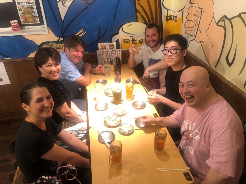 Hungry Osaka Street Food Tour: 15 Dishes & 3 Drinks - Stop four: charcoal yakitori and easy conversation