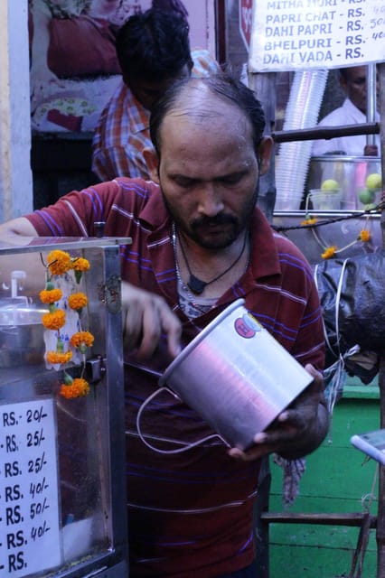 Kolkata Midtown Madness- A Street Food & Nightlife Tour - College Street adds sweets, books, and a historic coconut drink