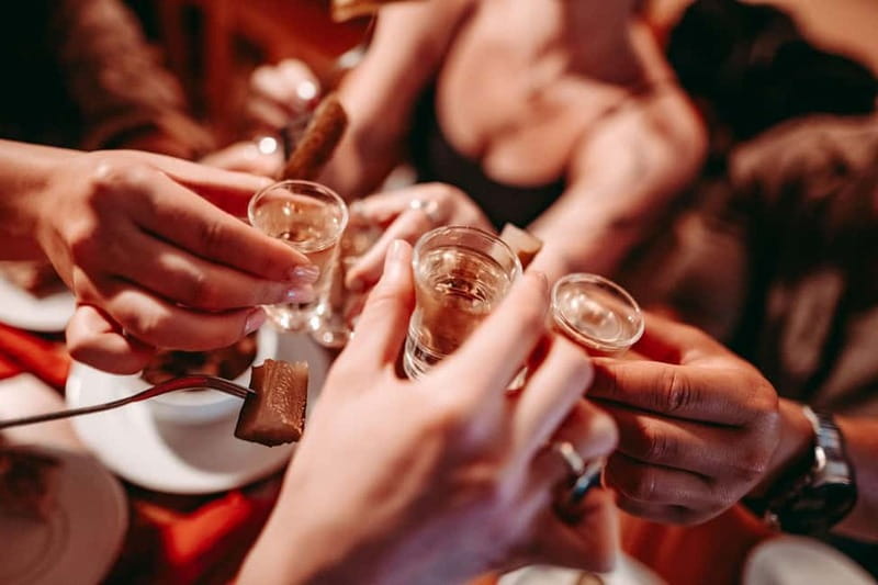 Krakow: Tipsy Polish Food Tour With History, Pierogi & Shots - Bigos, herring, pickles, bread, and smalec
