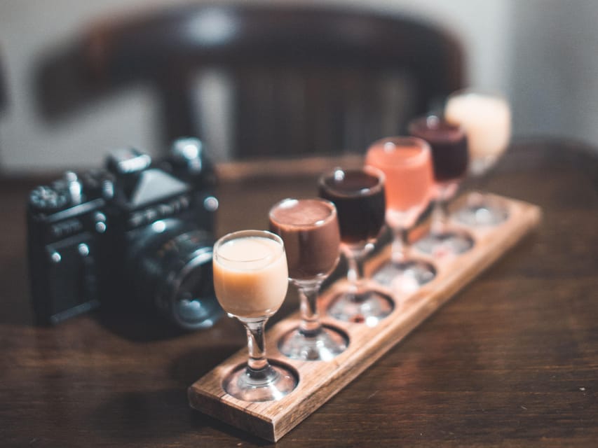 Krakow: Vodka Tasting Tour: Tapas, Tipsy Tales & Hidden Gems - A communist-era shot bar and a candlelit vodka café