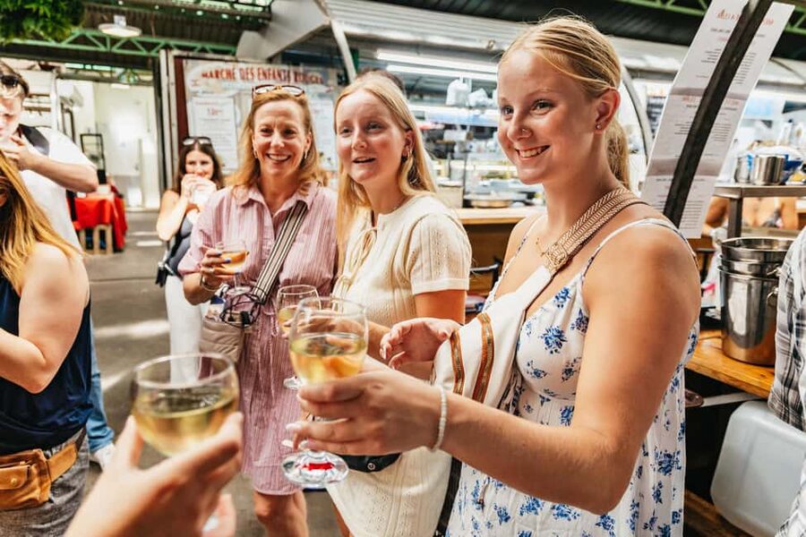 Le Marais Walking Food Tour with Cheese, Wine & Pastries - Marché des Enfants Rouges and the neighborhood stops