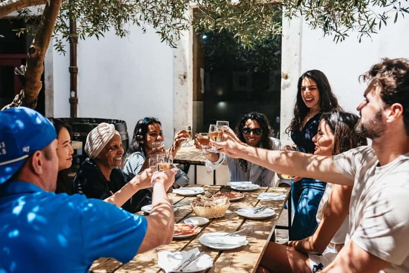 Lisbon: Baixa District Food Tour with Dinner and Drinks - Ginjinha Sem Rival for a classic Lisbon pause