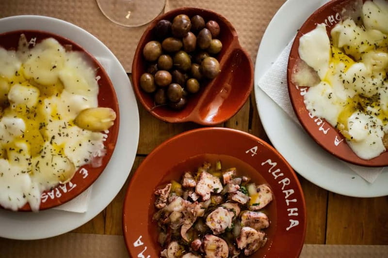 Lisbon: Food Tasting Tour by Tuk Tuk with 2 Stops - Alfama brings the old streets and local flavor