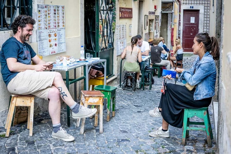 Lisbon: Food Tasting Tour by Tuk Tuk with 2 Stops - Graça supplies the views and a needed pause