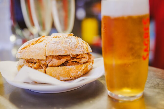 Lisbon Small-Group Portuguese Food and Wine Tour - Starting in Rossio with cod cake and Vinho Verde