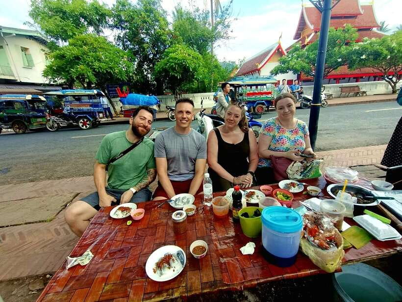 Luang Prabang: Foodie Walking Tour & Monk Blessing - Learning Lao food through smell, taste, and questions