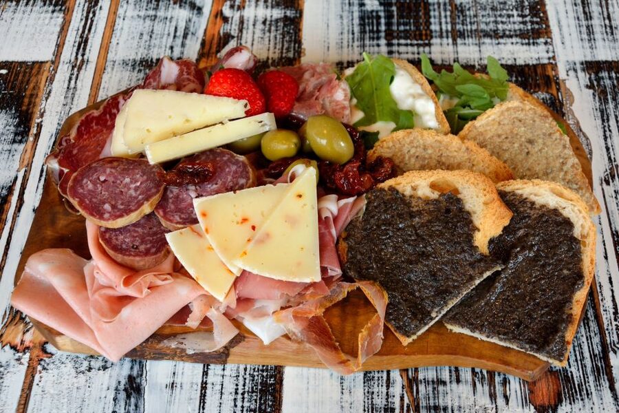Lucca: Guided Food Walking Tour with Tastings - Cecina, Buccellato, and the bakery stops
