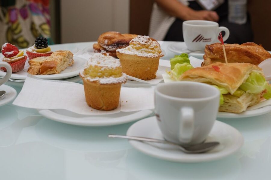 Lucca: Morning Food Tour with Snacks and Coffee - Amphitheatre Square and the Roman shape of Lucca