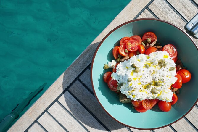 Luxury Catamaran Sunset Semi-Private & Greek Gastronomy in Athens - Vouliagmeni Beach depends on the weather