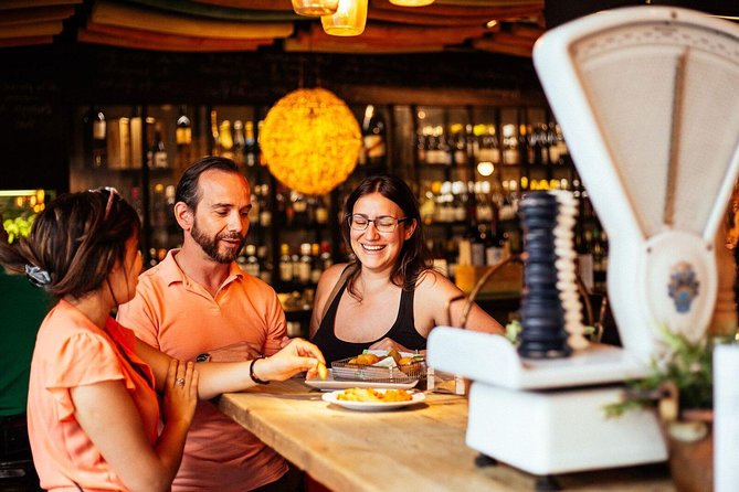 Madrid Private Food Walking Tour with 6 or 10 Tastings - Plaza de Chueca: food, drinks, and people-watching