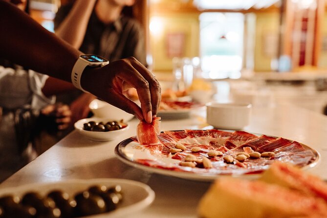 Madrid Tapas & Taverns Small Group Food & History Tour - Plaza Mayor and Puerta del Sol add the big Madrid sights