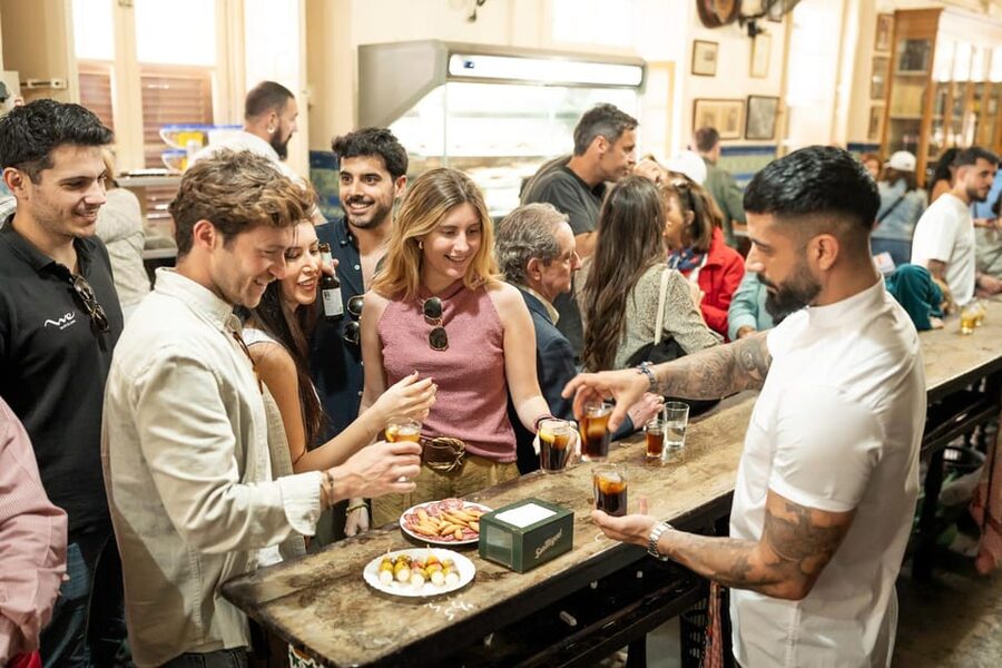 Málaga: Tapas, Wine & Rooftops Private Tour - Walking past Málaga’s Cathedral and port