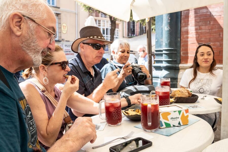 Malaga: Taste-of-Spain Walking Food Tour - Calle Larios and the old city rhythm