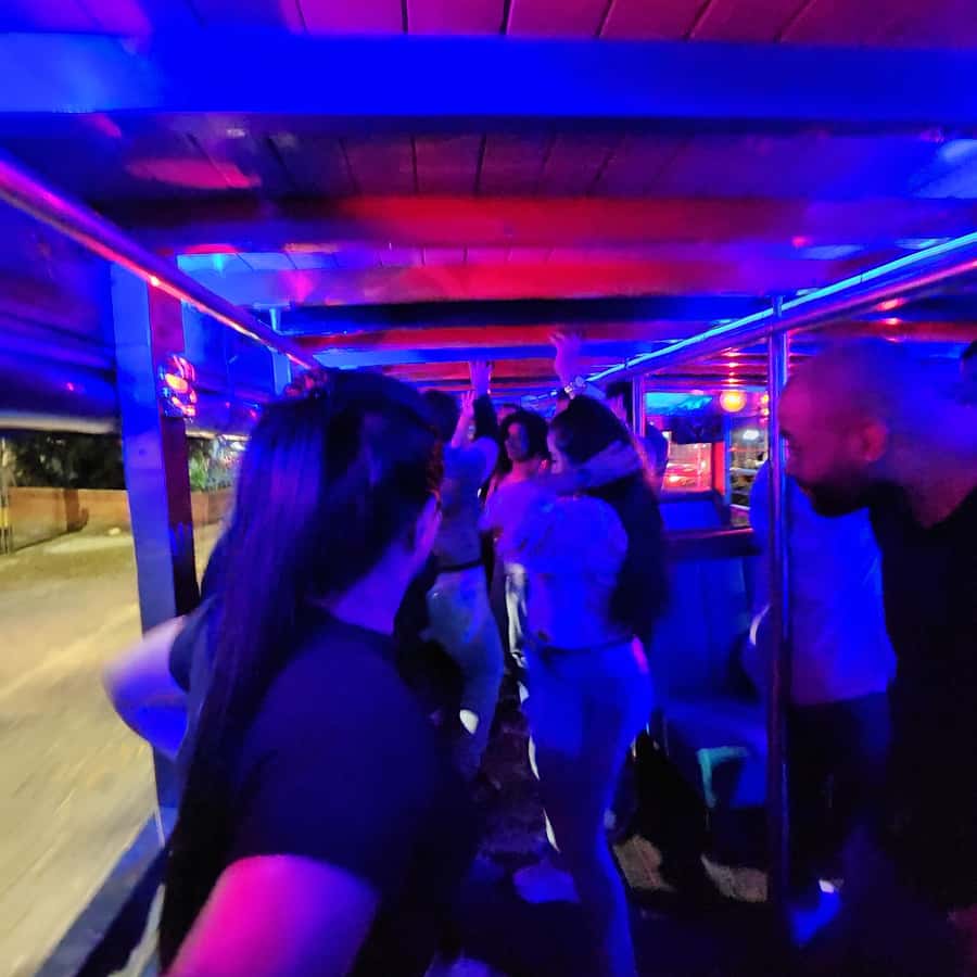 Medellin: Party Bus with DJ & Street Food Tastings - The illuminated Gilberto Echeverri Mejia Bridge