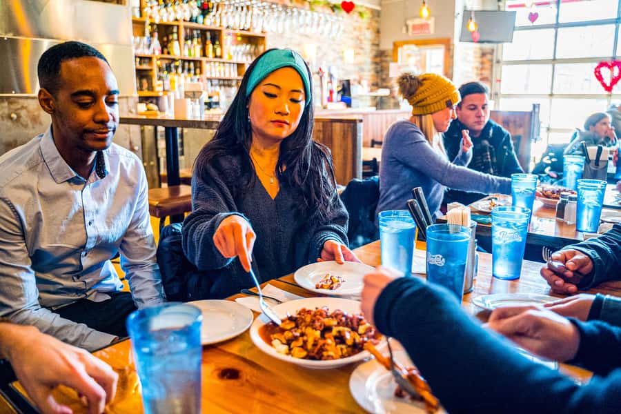 Montreal: Mile End District Food Tour with 8+ Tastings - Poutine With Smoked Meat and Fried Pickles