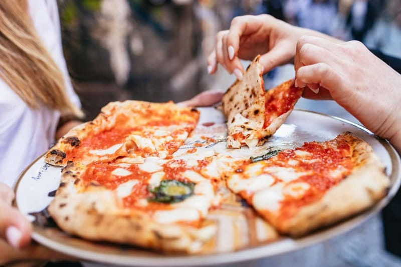 Naples: Street Food Walking Tour with Local Guide - Pizza folded for the street