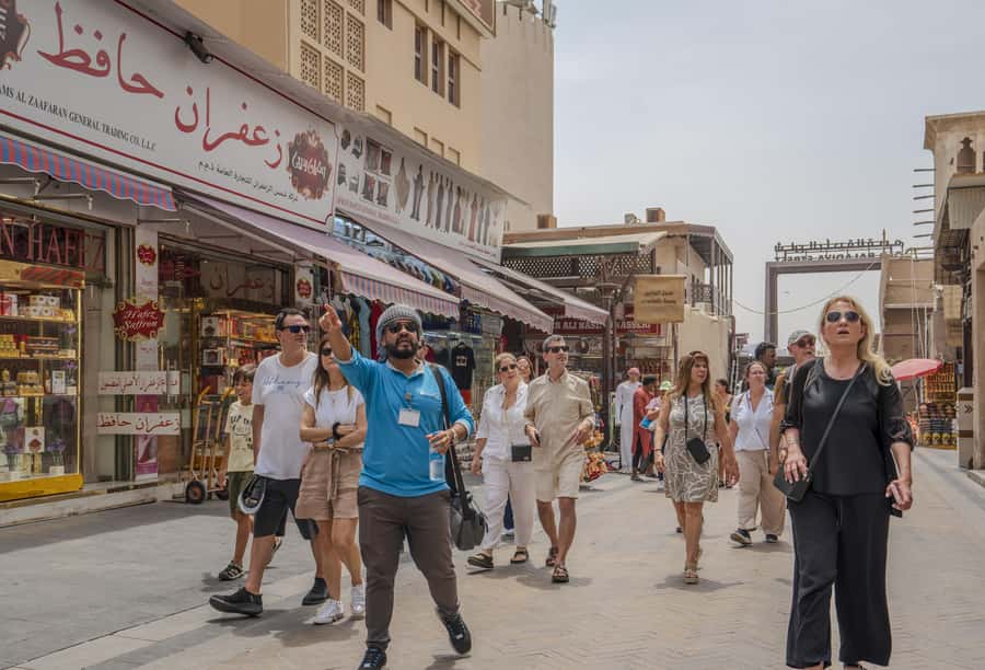 Old Dubai Historic Guided Tour: Creek, Street Food & Souks - Karak tea, samosas, and a useful walking break
