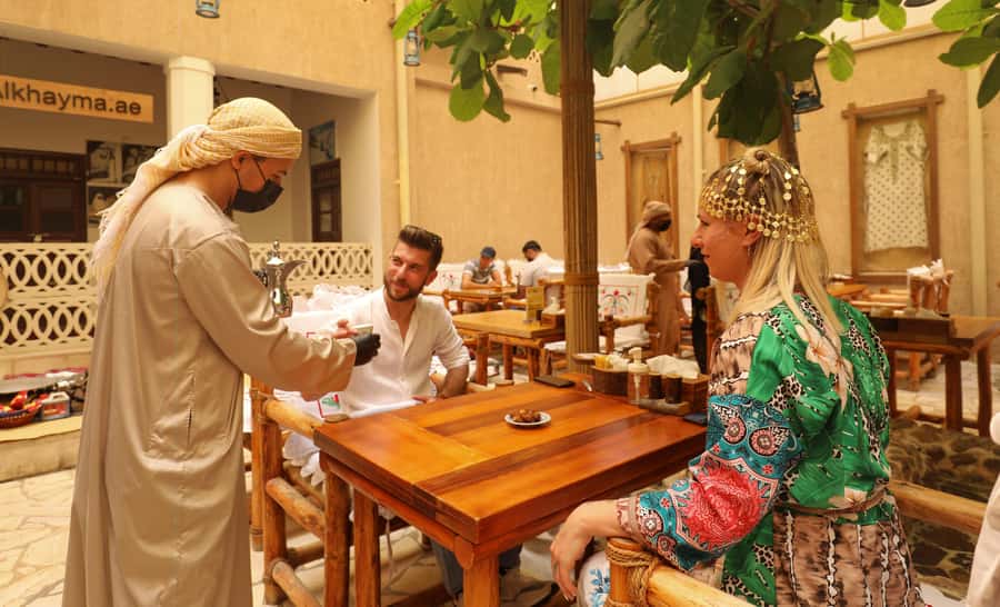 Old Dubai Historic Guided Tour: Creek, Street Food & Souks - Crossing Dubai Creek by traditional abra