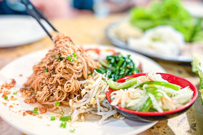Old Siem Reap Sunset Food Tour by Tuk-tuk - Phnom Krom, lotus fields, and dinner at a stilted home