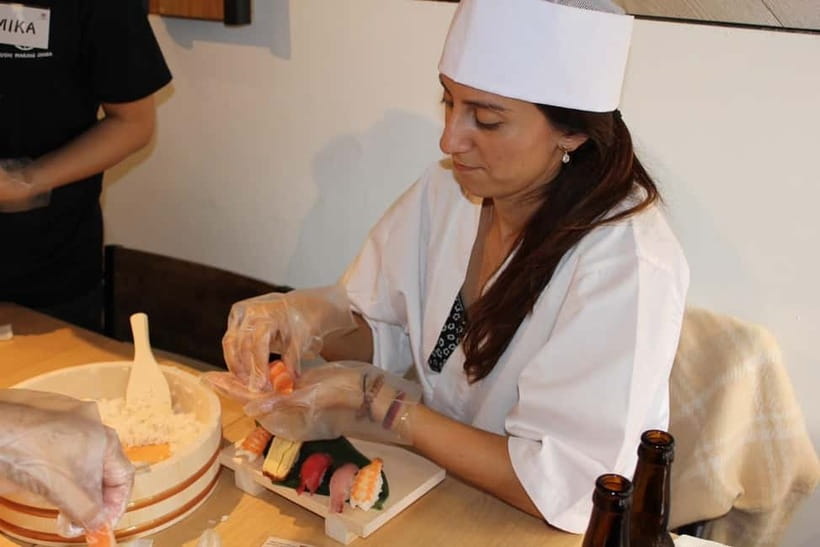 Osaka Dotonbori: Sushi Making Experience - Step two: adding wasabi and the neta