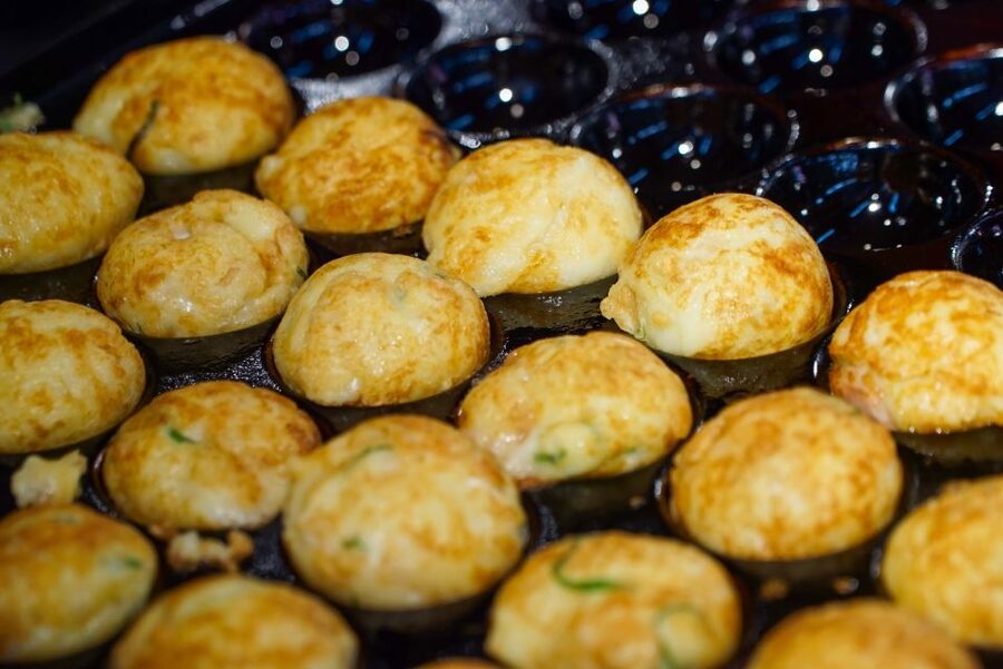 Osaka: Kuromon Market Food Walking Tour (6 stops, 6 tastes) - Hozenji Yokocho and a small shrine pause