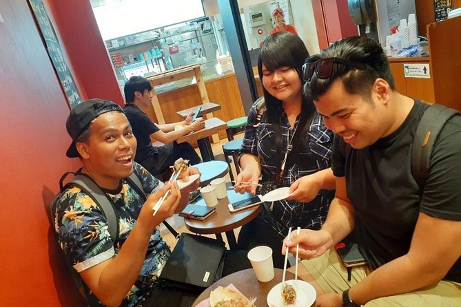 Osaka Local Foodie Walking Tour in Dotonbori and Shinsekai - Dotonbori’s neon and the Glico sign