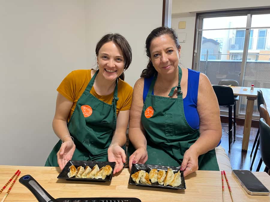 Osaka: Ramen and Gyoza Cooking Class in Dotonbori - Folding gyoza with minced chicken