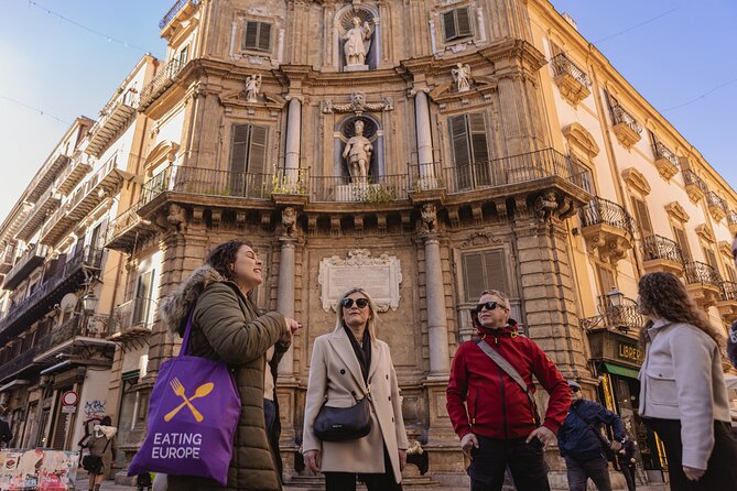 Palermo Evening Food & Wine Tour with Eating Europe - Walking through La Kalsa between bites