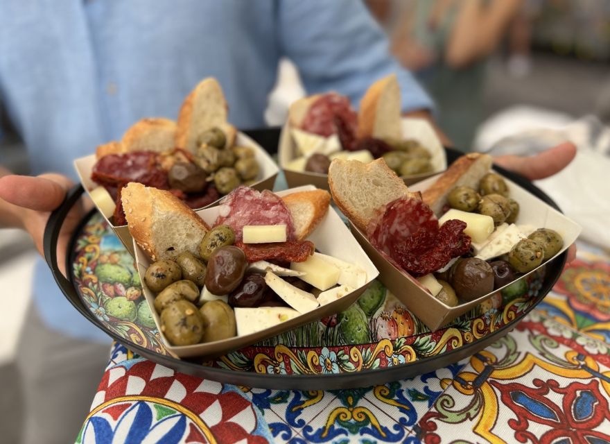 Palermo: Food Tour of 9+ Tastings, Arancini, Cannoli & More - Vucciria, local plates, and a glass of wine