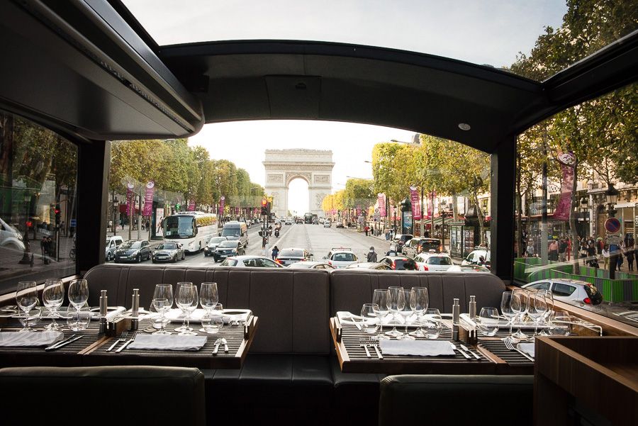 Paris: Bustronome Gourmet Lunch Tour - The fish and meat courses on a moving bus