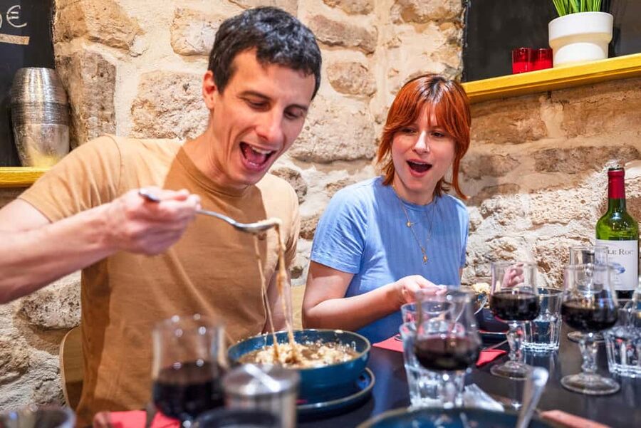 Paris: Champagne and Oysters Food Tour - French cheese at the oldest covered market