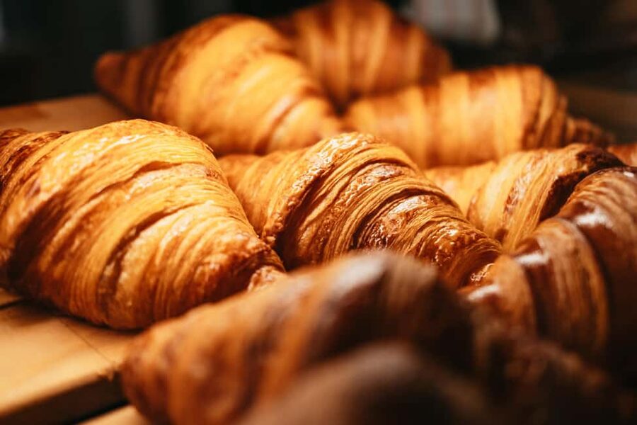 Paris: Gourmet Food Tour with Over 10 Tastings and Wine - A wine-bar stop with cheese and charcuterie