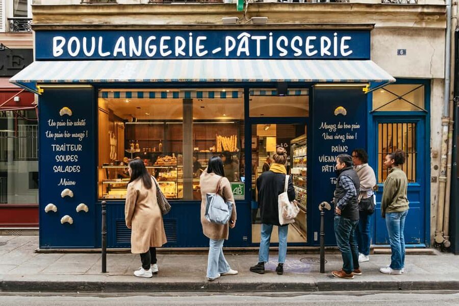 Paris: Gourmet Food Tour with Over 10 Tastings and Wine - Starting with viennoiseries near Place Colette