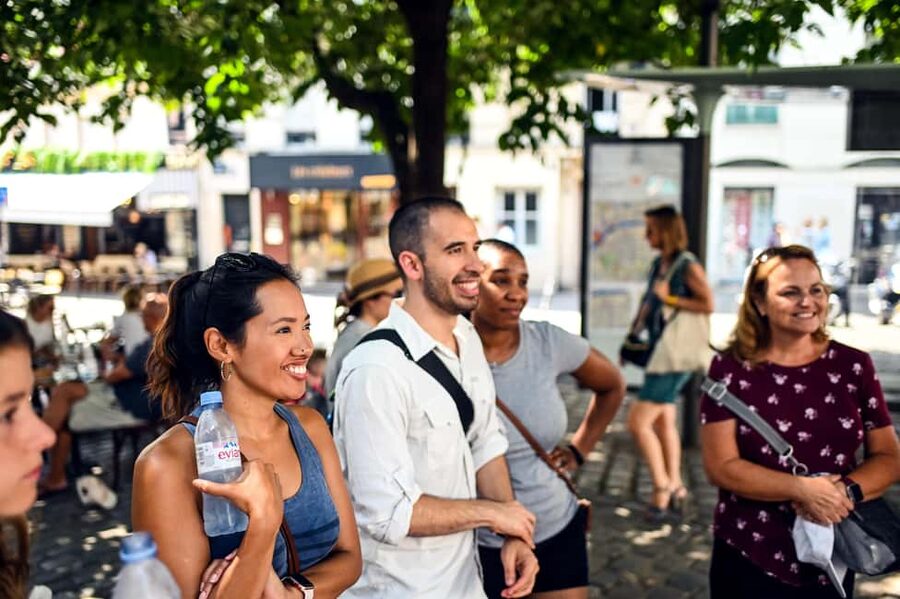 Paris: Montmartre Food Tour with 10 Local Tastings & Wines - Bread and charcuterie from working food shops