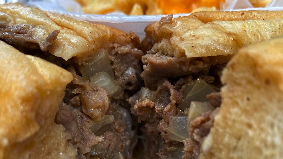 Philadelphia: Flavors of Philly Guided Foodie Tour - Cheesesteaks and cheese fries, the main event