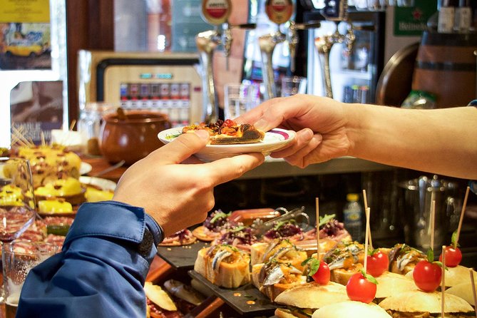Pintxo and Tapas tour with local Food Expert - Stories, plazas, and the question about the dogs