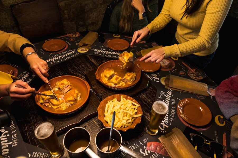 Porto: Food & Wine Tasting Walking Tour with Port Wine Cave - Start at Jardim do Morro for the classic Porto view